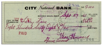 Moe Howard Check Signed to Larry Fine in Red Ink -- Endorsed by Larry on Verso -- Dated 27 September 1961 -- Some Smudging, Very Good Condition